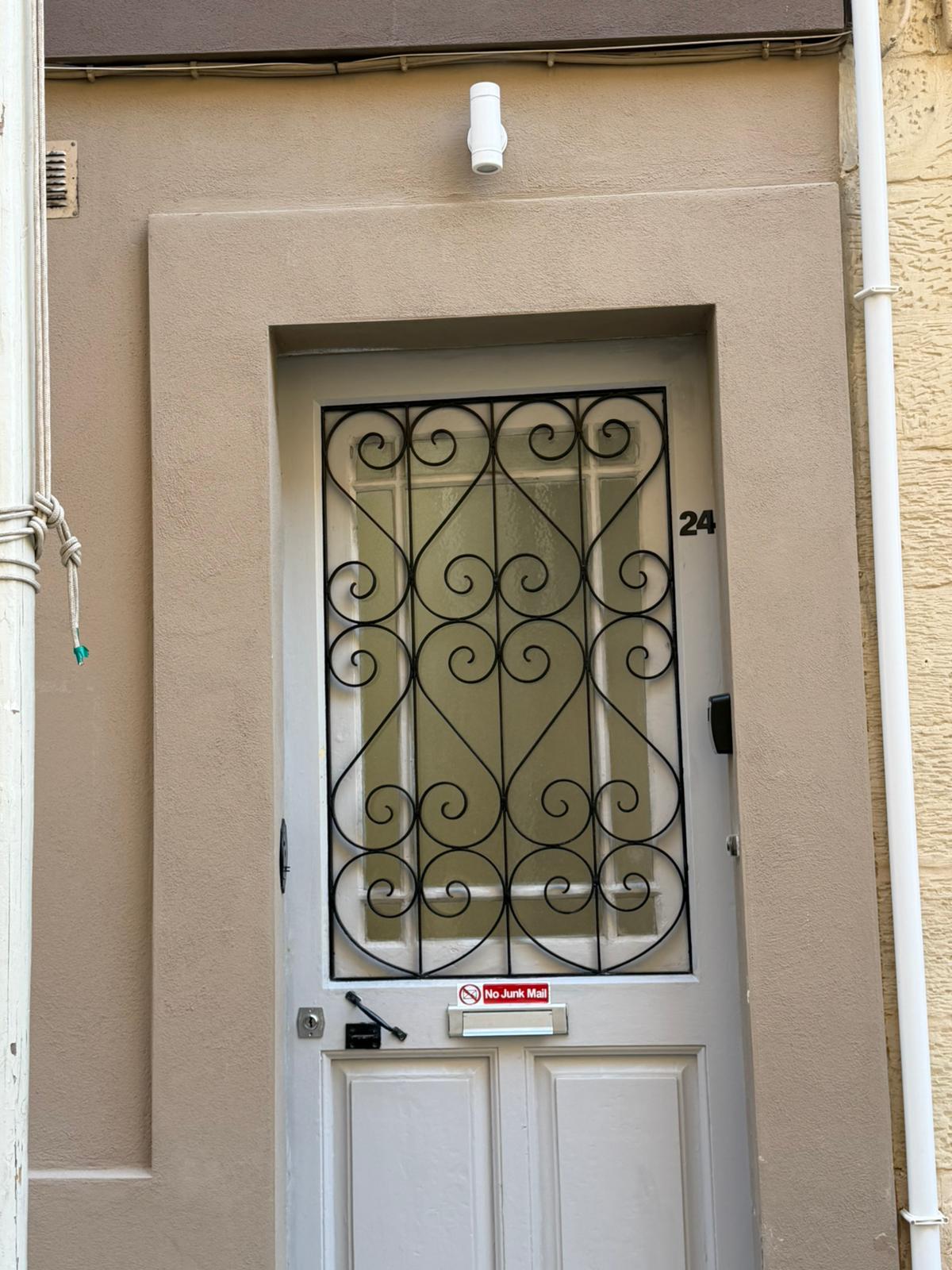 Cream-coloured door, number 24